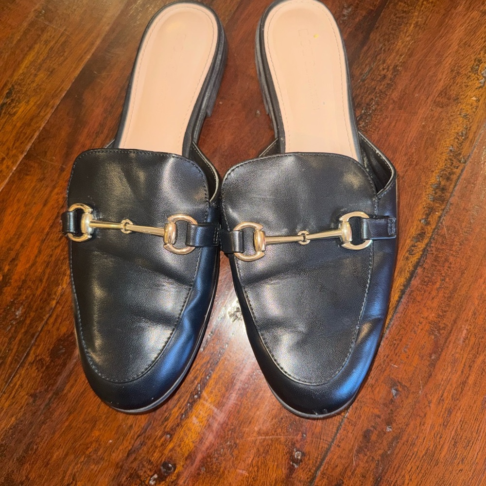BCBGeneration Black Leather Mules with Gold Accent
